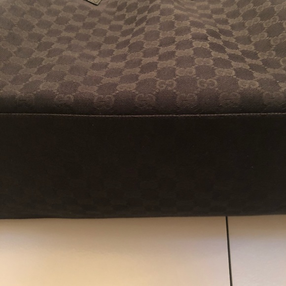 Gucci GG monogram duffle bag with signature straps